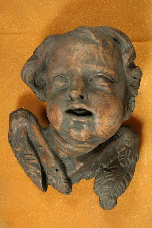 neznámý sochař středomoravský - Okřídlená hlava andílka